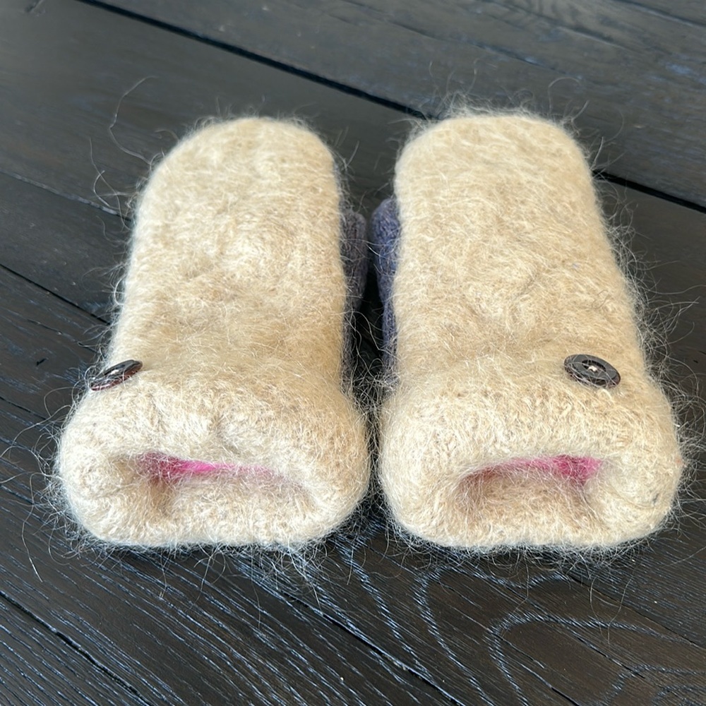Brand new up cycle handcrafted, wool sweaters into mittens.